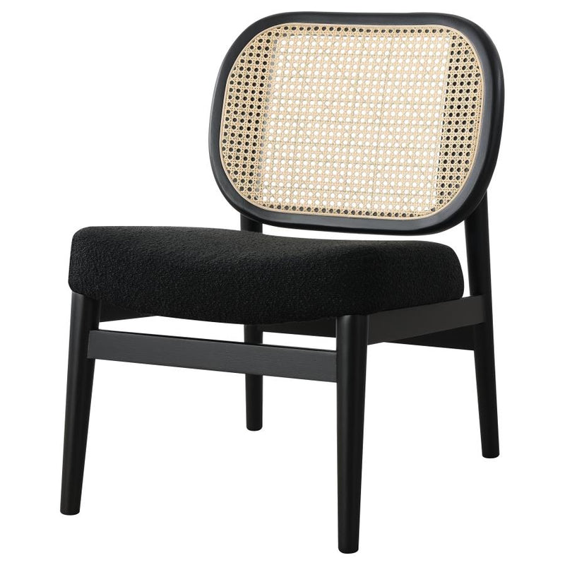 The Elira Cane Back Lounge Chair by Clayson Design