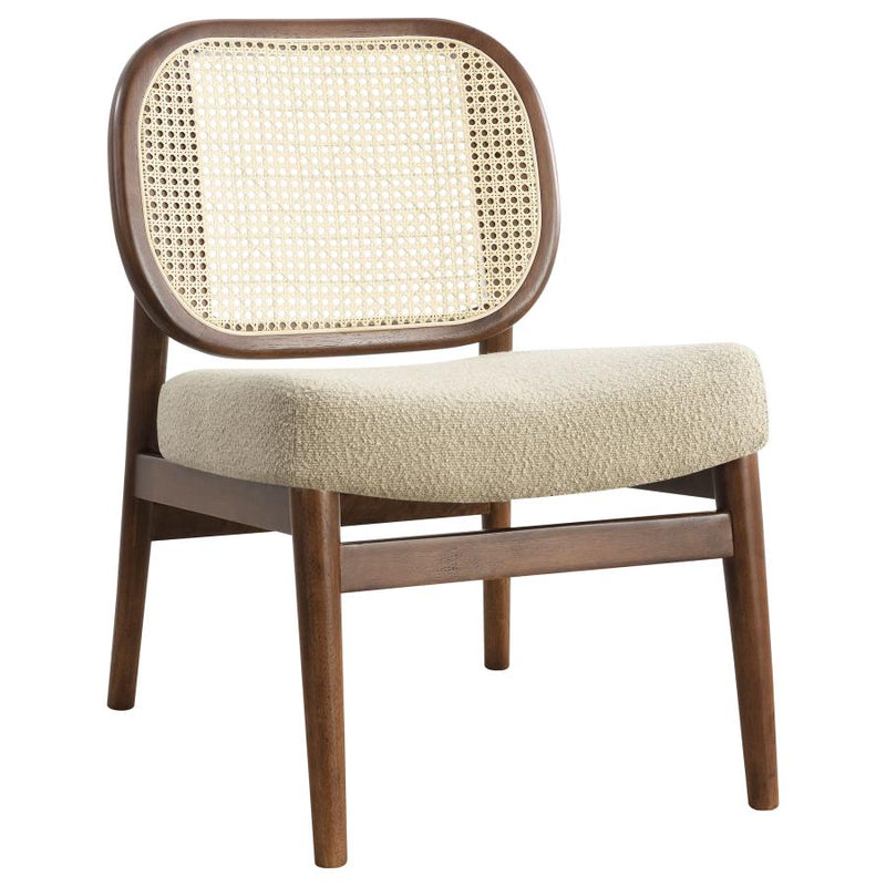 The Elira Cane Back Lounge Chair by Clayson Design