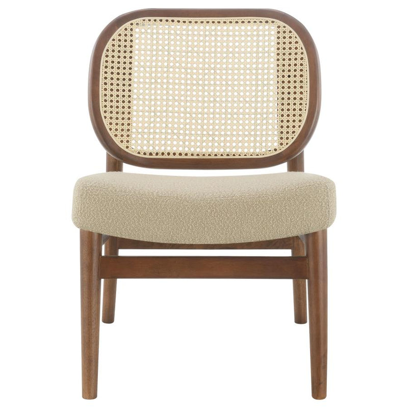 The Elira Cane Back Lounge Chair by Clayson Design