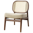 The Elira Cane Back Lounge Chair by Clayson Design