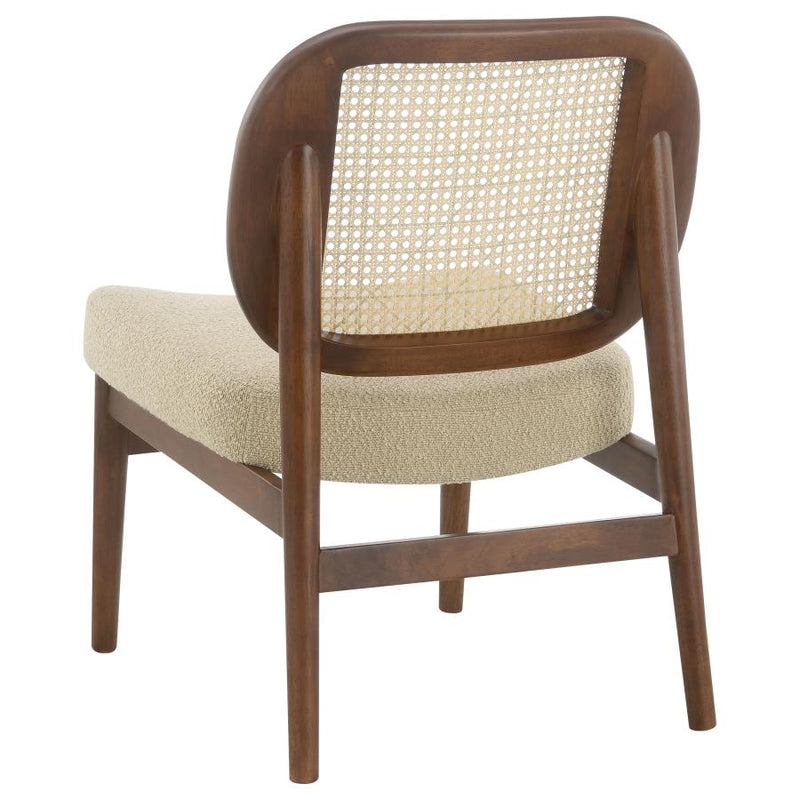 The Elira Cane Back Lounge Chair by Clayson Design