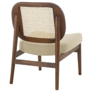 The Elira Cane Back Lounge Chair by Clayson Design