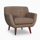 The Lyra Button-Back Lounge Chair by Clayson Design