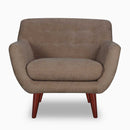 The Lyra Button-Back Lounge Chair by Clayson Design
