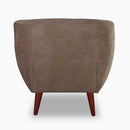 The Lyra Button-Back Lounge Chair by Clayson Design