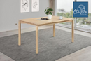 The Parkview Whitewashed Rectangular Dining Table by Clayson Design
