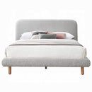 The Marlow Curved Bouclé Bed by Clayson Design