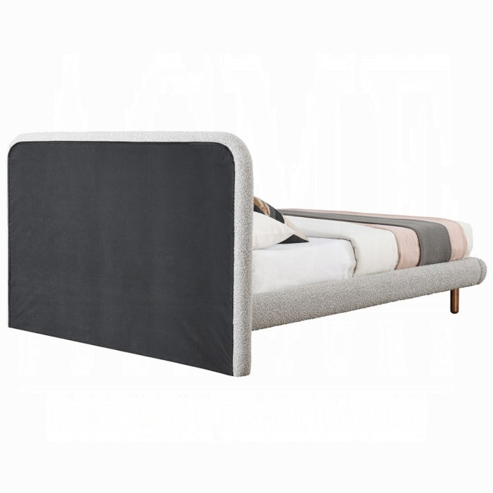 The Marlow Curved Bouclé Bed by Clayson Design